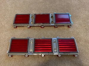 NOS 1980-1985 CHEVY CAPRICE CLASSIC BOX TAILLIGHT LAMP LENS & BEZELS SET - Picture 1 of 7