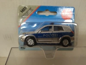 TOYOTA RAV4 POLIZEI 1:55/apx 1:64 SIKU 1403 BOX - Imagen 1 de 3