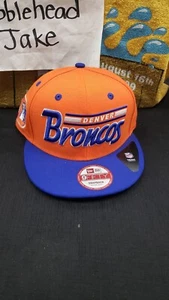 NWT DENVER BRONCOS SNAPBACK CAP HAT NEW ERA 9FIFTY 950 SNAP SCRIPT MEDIUM-LARGE - Picture 1 of 5