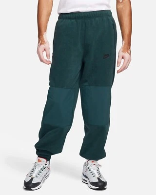 Pantalones deportivos Nike Club polar polar polar con bolsillos con cremallera FB8384 $95 para hombre L Foto 1 de 4