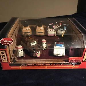 Disney Cars 2 Traveling Thru Tokyo Die cast Set NIB - Picture 1 of 10