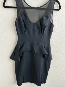 Neu ohne Etikett bebe XS schwarzes Kleid Schößchen Illusion Ausschnitt tailliert strukturiert - Bild 1 von 11