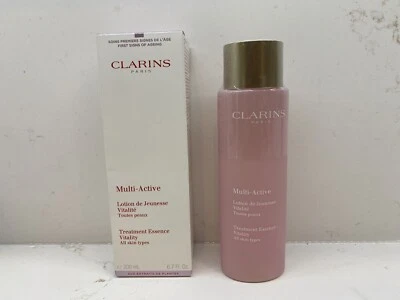 Clarins Tratamiento Multiactivo Esencia Vitalidad TODOS LOS TIPOS DE PIEL 6,7 OZ SELLADO NUEVO EN CAJA Foto 1 de 2