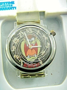 TAZMANISCHE UHR / KLARES KUNSTSTOFFBAND / NEUE BATTERIE / ARMITRON Box 132 - Bild 1 von 5