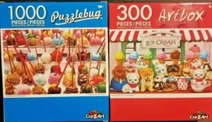 Zwei Puzzles 1000 Stck. 14x22 kandierte Äpfel & 300 Stck. 18,25 x 11 Welpensalon - Bild 1 von 3