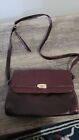 Preowned Good Condition etienne aigner handbag.  6 Compartments 