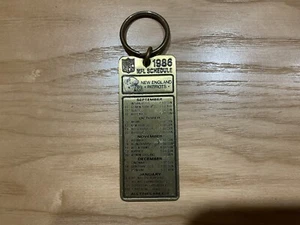1986 New England Patriots’ Schedule Brass Key Chain - Picture 1 of 2