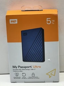 Disque dur externe ultra portable WD 5 To My Passport, bleu - WDBFTM0050B (3103) - Photo 1/8