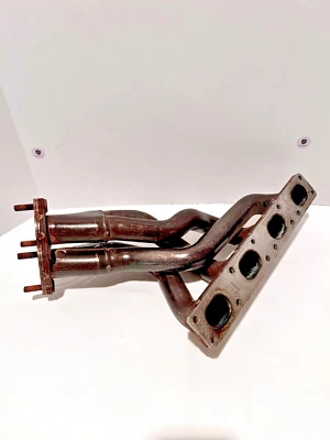 Cabezal colector de escape BMW E36 318i M44 OEM 11621432343 Foto 1 de 4