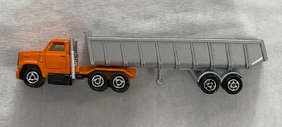 Vtg Majorette Diecast 1:100 scale Semi Trailer Dump Truck, Orange &  Silver - Image 1 of 4