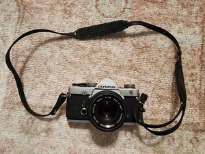 Olympus OM-1 fotocamera pellicola nera F Zuiko Auto-S 50 mm 1:1.8 GIAPPONE - Foto 1 di 7