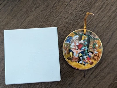 Disco de Navidad Walt Disney 1989 adorno Pinocho Geppeto porcelana nuevo en caja Foto 1 de 3