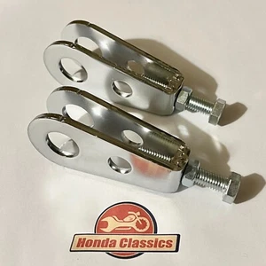 Ajustadores de cadena de cuatro ruedas traseras Honda CB350F, par. 40543-471-000P - Imagen 1 de 2
