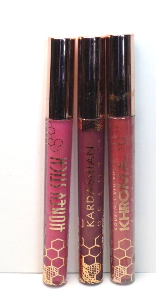 BRILLO DE LABIOS KARDASHIAN 3 PIEZAS - MIEL SILVESTRE, CARA NEGRITA Y MIEL DORADA Foto 1 de 2