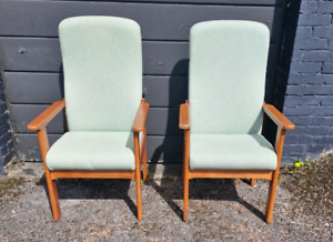 Two Parker Knoll Teal high back living room / lounge arm chairs. Good condition.
