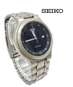 Seiko Titanium Solar Black Dial Silver Date Watch Working - Picture 1 of 6