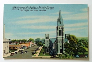 POSTCARD PANORAMA SECTION OF LARAMIE WYOMING POST OFFICE BUS DEPOT ABBEY #811gf - Picture 1 of 2