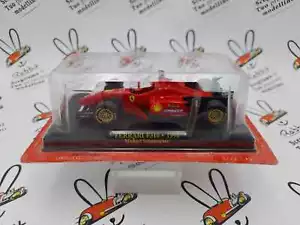 DIE CAST " FERRARI F310 - 1996 MICHAEL SCHUMACHER + BOX 1 " SCALA 1/43 - Foto 1 di 2