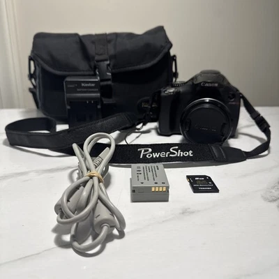 Canon PowerShot SX40 HS 12.1MP Digital 35x Zoom Full HD Camera SD Bag Charger - Image 1 of 4