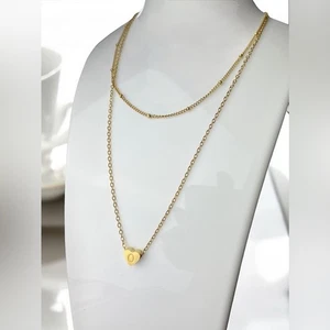 Juego inicial de corazón enchapado en oro de 2 cadenas en capas “O” nuevo en caja - Imagen 1 de 5