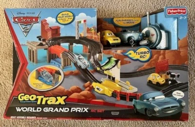 Fisher Price Disney Pixar Cars 2 GeoTrax World Grand Prix RC Set 2011 Sealed - Image 1 of 4