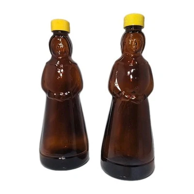 Set Of 2 Mrs Butterworth Glass Bottles with yellow lids 10" - Image 1 of 4
