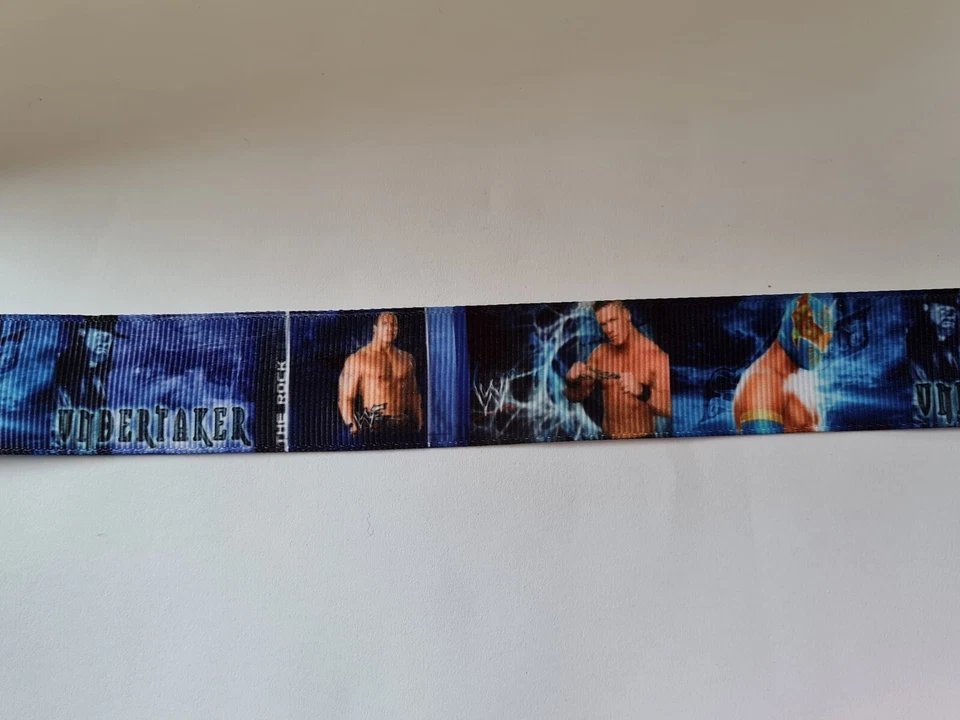 2 meters of WWE wrestling print grosgrain ribbon 1" wide - Image 1 of 1