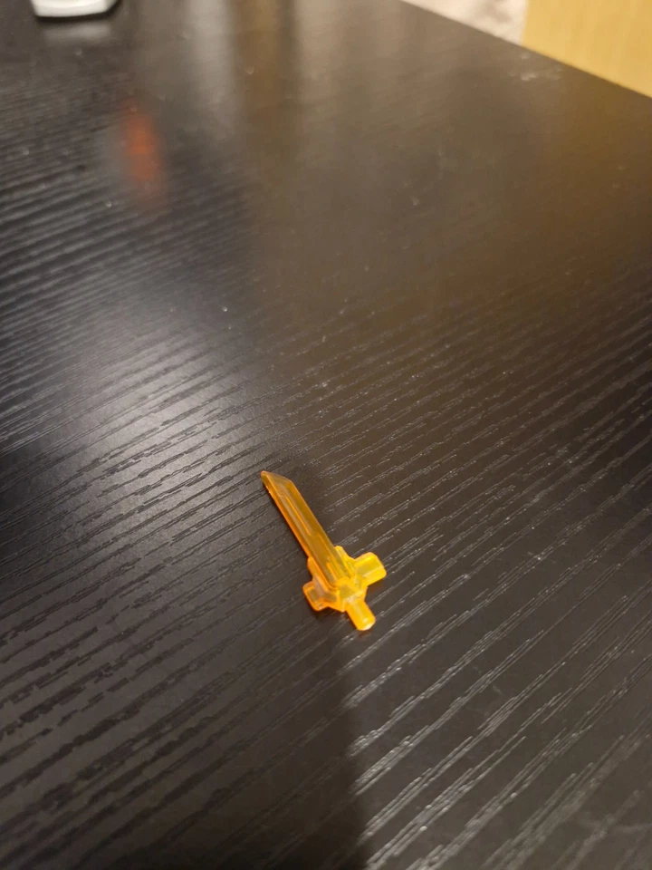 Lego trans neon orange sword - Image 1 of 1