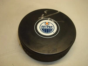 Disco de hockey autografiado 1A por Ryan Nugent-Hopkins firmado Edmonton Oilers - Imagen 1 de 2