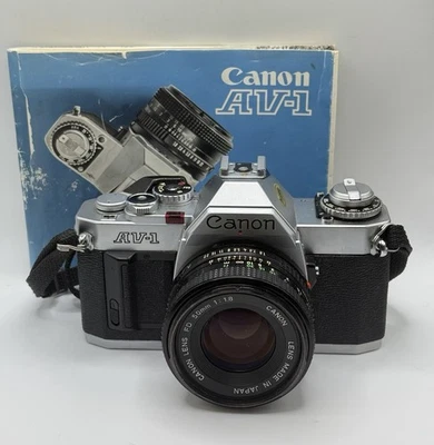 Cámara fotográfica Canon AV-1 SLR 35 mm con correa de lente FD 50 mm f/1,8 plateada probada BONITA Foto 1 de 4