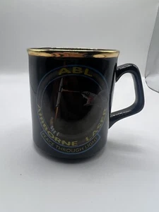 ABL Airborne Laser Mug Peace Through Light Black Gold Rim Rattlesnake Missile - Picture 1 of 3