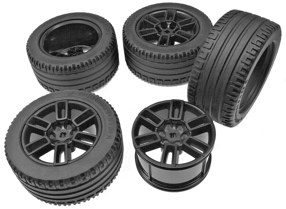 LEGO Technik - 4 Reifen 81,6x36 mm m. Felge schwarz 56x34 mm x1825 49294 NEUWARE - Bild 1 von 1