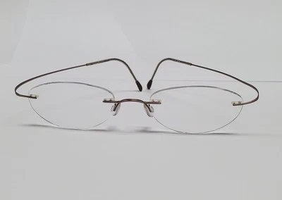 Marco de gafas Silhouette M7395 titanio arena sin montura 50 20 150 titanio sin bisagras Foto 1 de 4