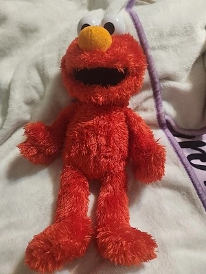 Juguete de peluche Sesame Street Tickle Me Elmo de 10 pulgadas Foto 1 de 3