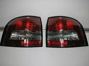 TAIL LIGHTS PAIR TAIL LAMPS LEFT AND RIGHT HOLDEN COMMODORE VE VF UTE SSV SS SV6 - Picture 1 of 3