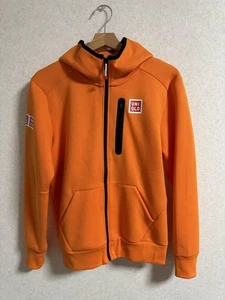 Giacca tennis Uniqlo Kei Nishikori taglia M (US S) logo felpa arancione esaurita - Foto 1 di 24