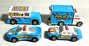 Mini vehículos policiales Hot Wheels 1997 4 coches y furgonetas - Imagen 1 de 3