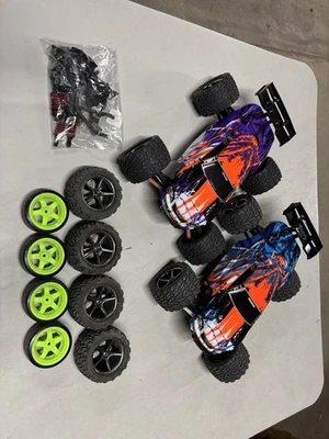 Pair Of Traxxas 1/16 Erevo Rollers With Bodies, Servos, And Extras - Image 1 of 4