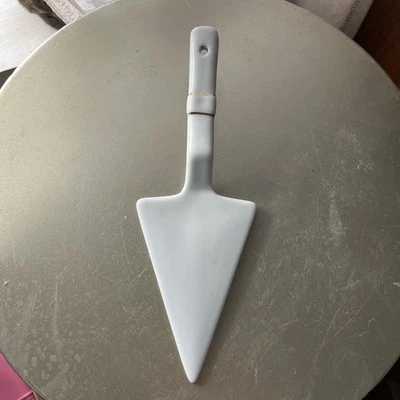 Cuchillo para pasteles vintage servidor cerámica blanca acento dorado  Foto 1 de 4