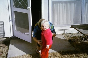 1965 Grumpy Cute Blond Child Getting Fitted The Cold 4x6 Vintage Photo Reprint - Bild 1 von 2