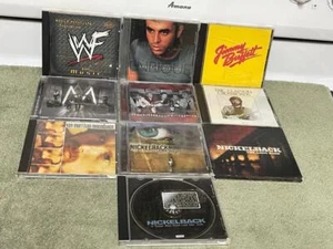 10 CDs:NICKLEBACK, MAROON 5, VAN MORRISON,ERIC CLAPTON,WWF,JIMMY BUFFET & MORE - Foto 1 di 1