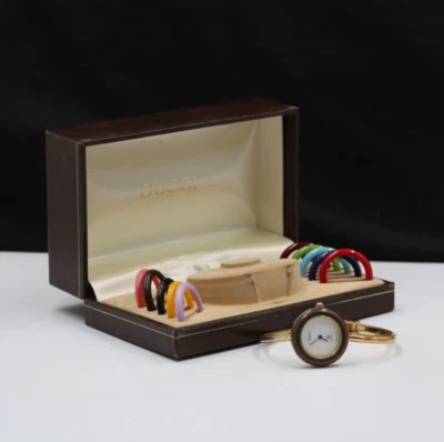 Gucci 1100 Interchangeable Bezel Bangle Quartz Watch Plated Metal with Plastic - Image 1 of 4