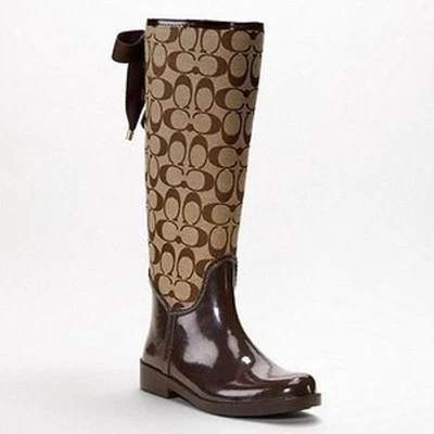 BOTAS DE LLUVIA COACH TRISTEE FIRMA CAQUI LONA CON CORDONES CORSÉ US 7 I LOVE SHOES Foto 1 de 4