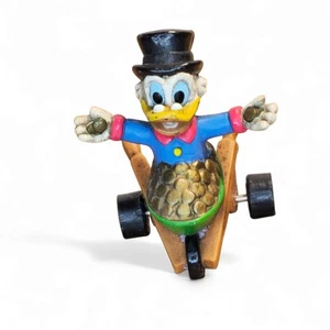 Vintage Walt Disney Uncle Scrooge McDuck PVC Toy Figure Applause 1.5" Long - Picture 1 of 3