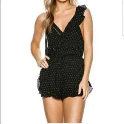Mameluco Free People One of These Days con volantes negro XS NUEVO CON ETIQUETAS Foto 1 de 4