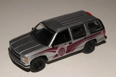JOHNNY LIGHTNING 1997 CHEVROLET TAHOE, SILVER POLICE VEHICLE, 1:64, EXCELLENT - Image 1 of 4