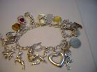 SUPERB VINTAGE SOLID SILVER CHARM BRACELET-7.5 INCHES LONG ! 19 CHARMS INCREDIBL