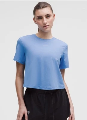 NUEVO CON ETIQUETAS Camiseta sin mangas Lululemon Pace Crush espalda cruzada gráfica piscina fiesta azul mediano Foto 1 de 4