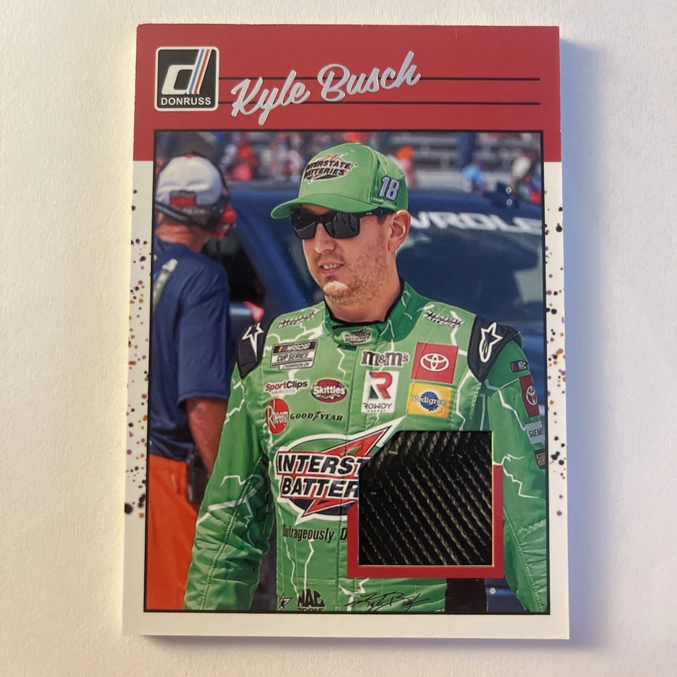 Kyle Busch 2023 Panini Donruss Racing Retro 1990 Race Worn Material - Image 1 of 2