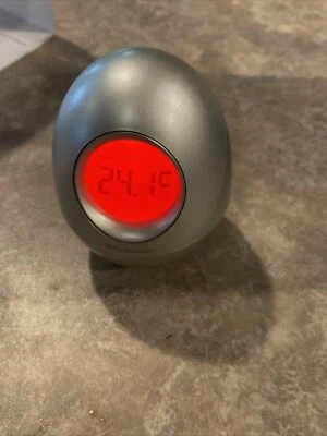 Brookstone “Bob” Silver Oval Egg Wobble Clock 5-in-1 Alarm Date Timer Temp Time  - Image 1 of 4